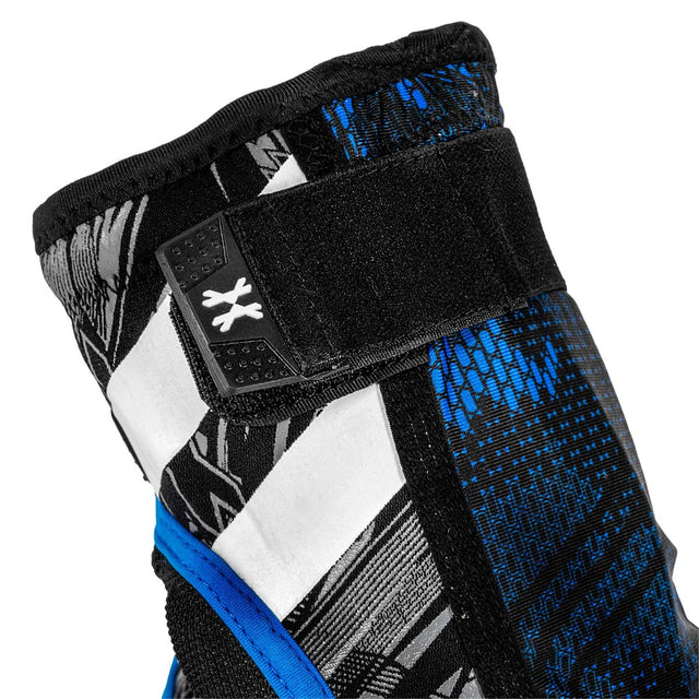 Velcro end of Black blue and white HK Army Crash Elbow Pads for paintball and other sports on a white background