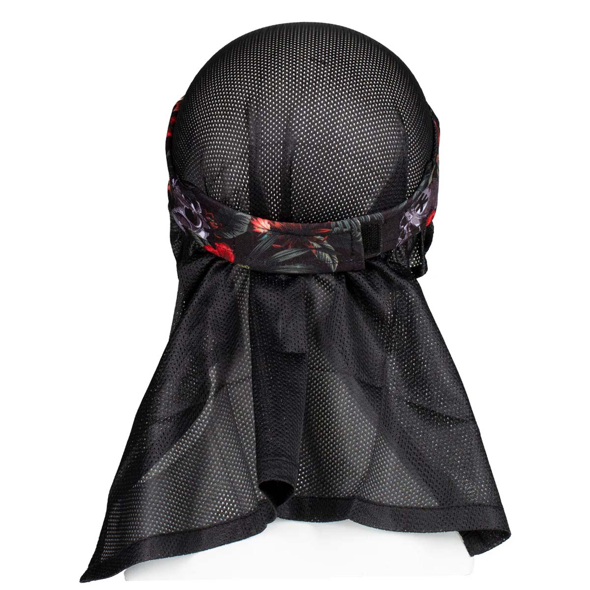 Back of HK Army Headwrap Tropical Skull Black, red, grey and green patterned headscarf on a mannequin head against a white background