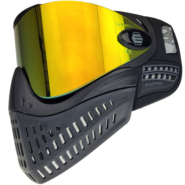Black paintball mask with yellow red lens Empire E-Vent Goggle Black w fire Lens on a white background