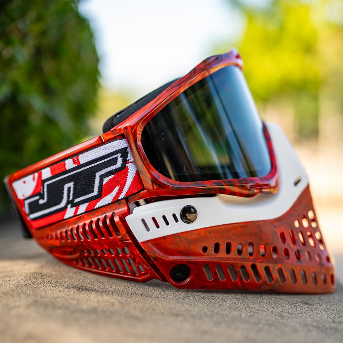 JT ProFlex Goggle LE Marble Red White Away on pavement no visor