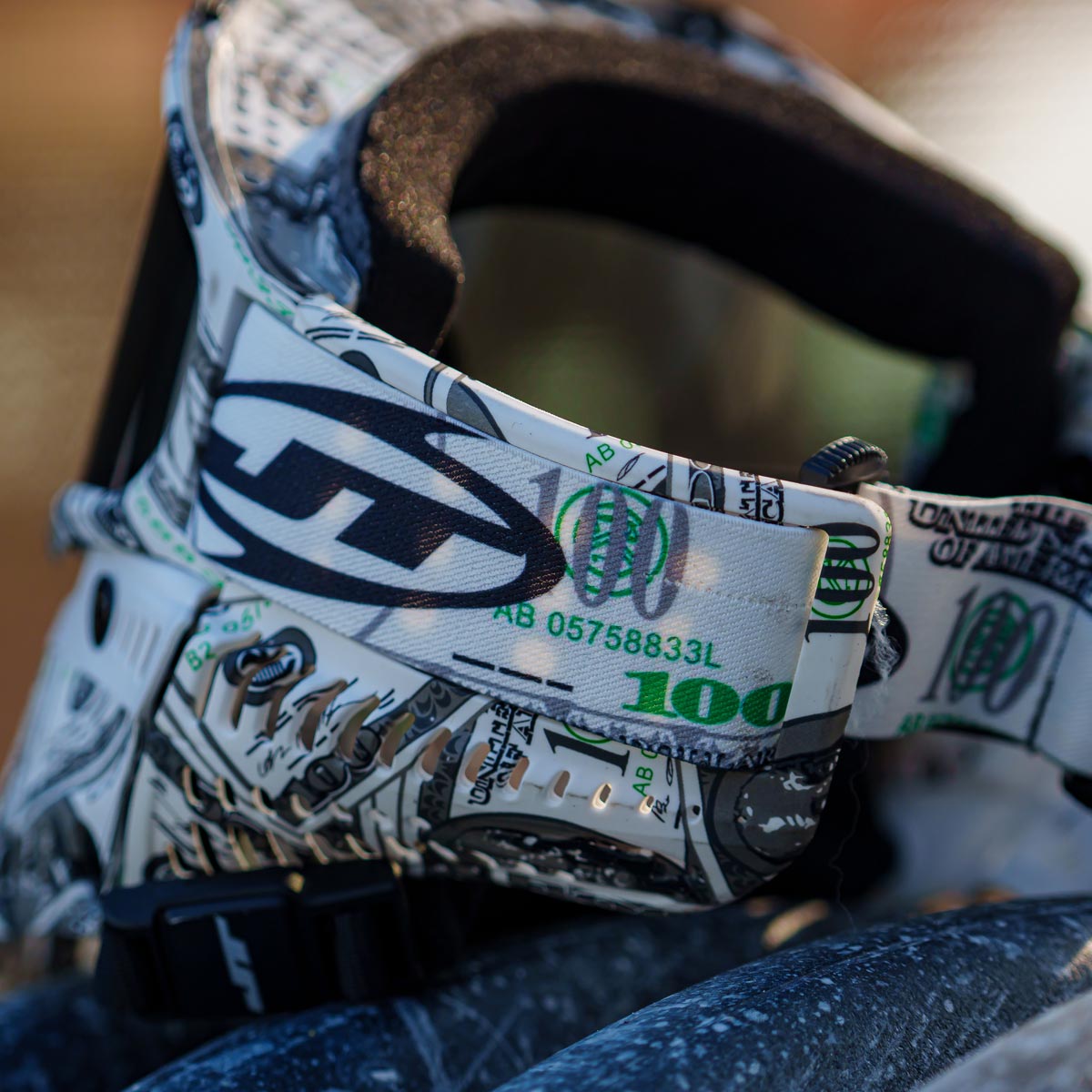 JT ProFlex 100 Dollar Bill Goggle LE with Extra Lens strap close up