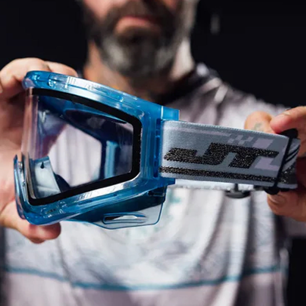 JT QLS Goggle Frame with Lens and Strap Aquamarine Ice in players hands
