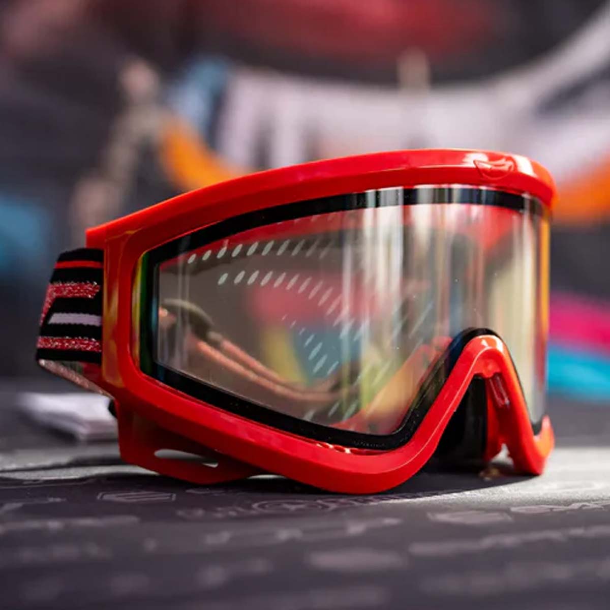 JT QLS Goggle Frame w Lens and Strap Brimstone Red for JT Proflex paintball goggle on a busy background