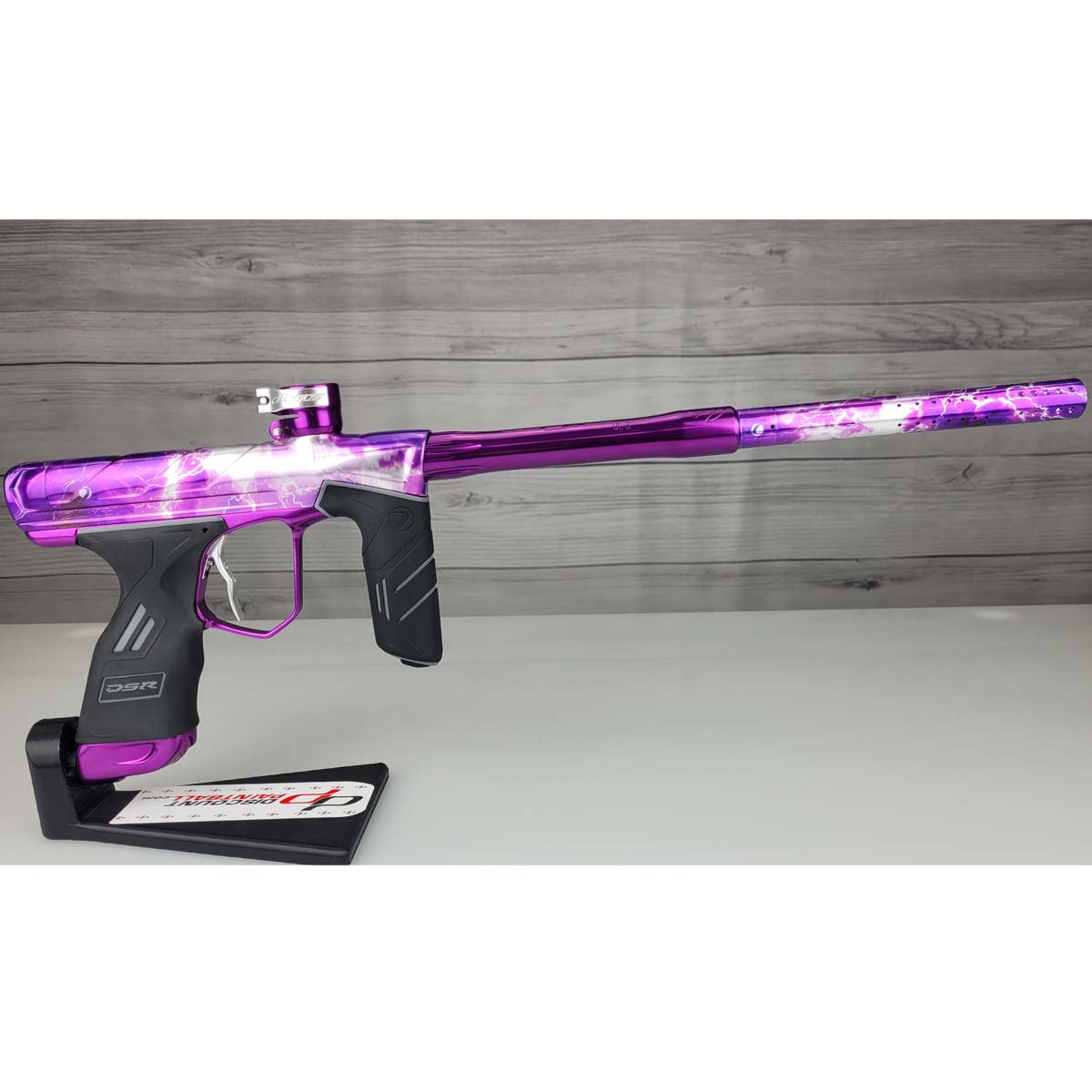 Right side USED DYE DSR Pro PGA Grimace Purple Splash against a wood panel background.