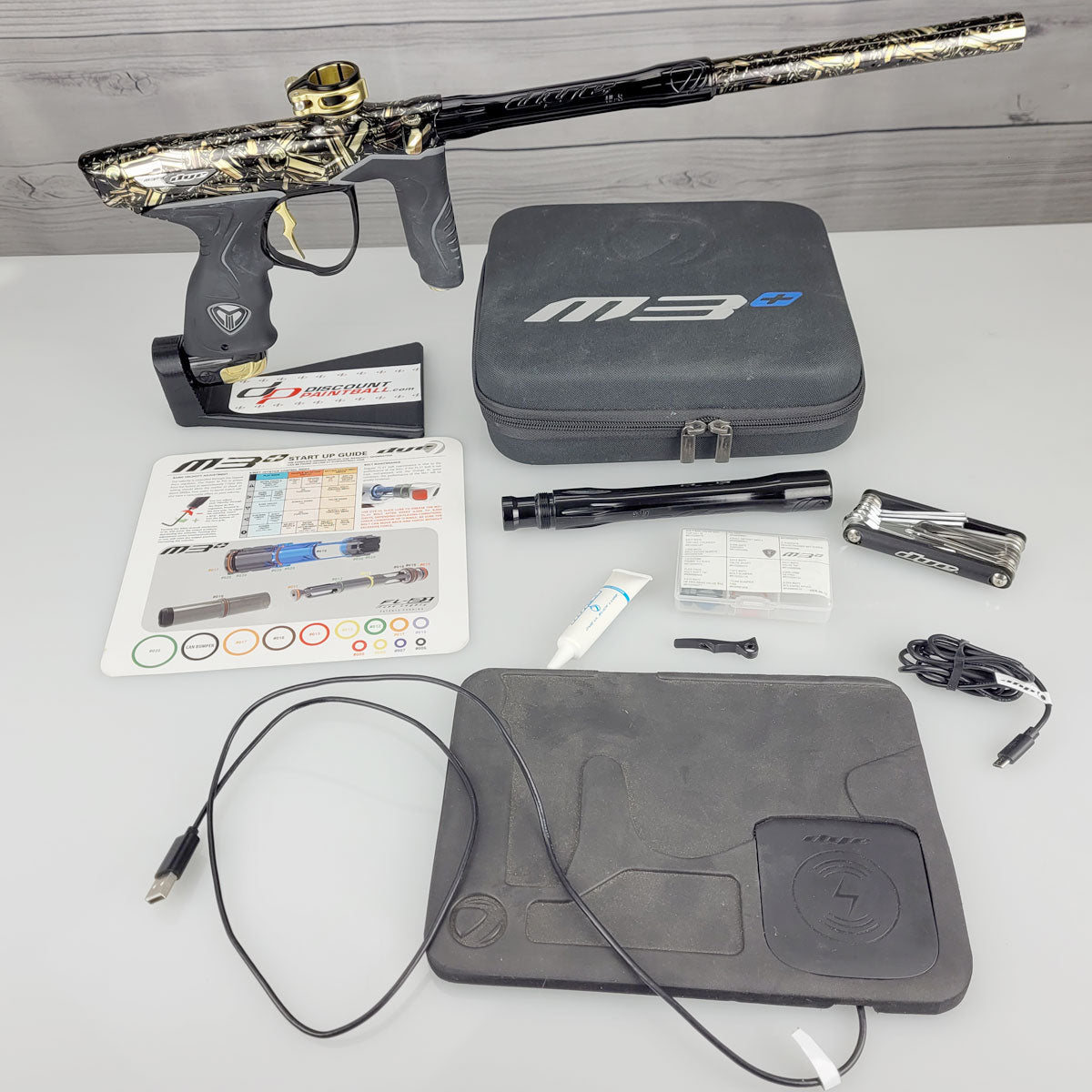 Dye M3+ Paintball Marker Gold w case and wireless charger USED