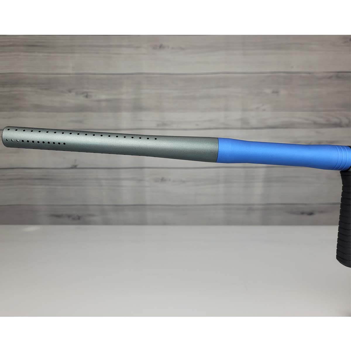 Left side barrel USED Planet Eclipse 180R Paintball Marker Grey Blue on a panel background