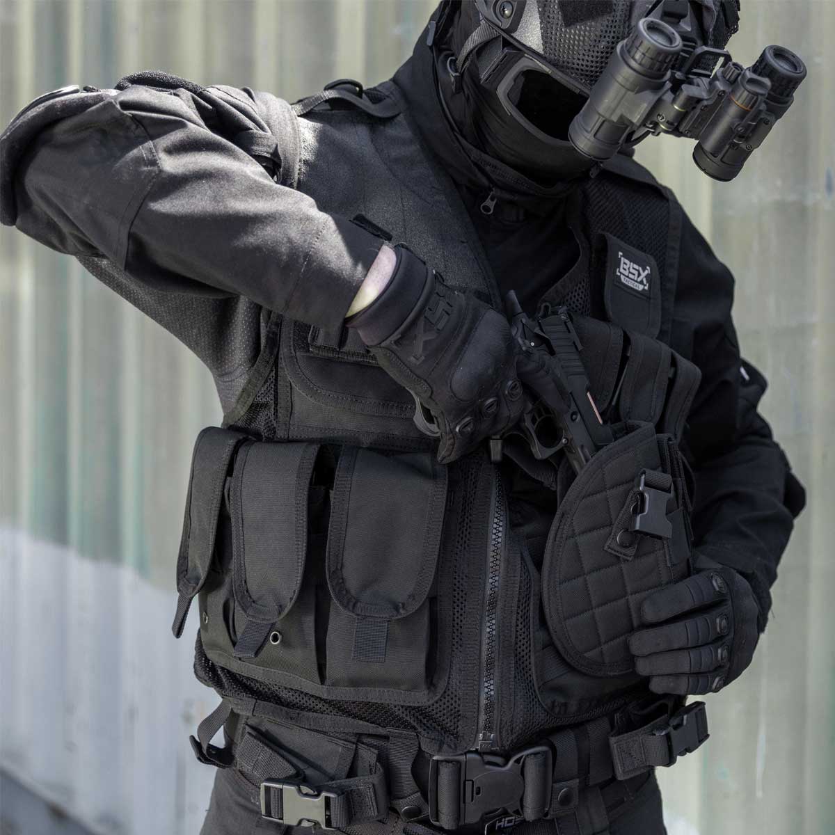 black BSX Crossdraw Vest for for airsoft and paintball, shown on a person wearing tactical gear