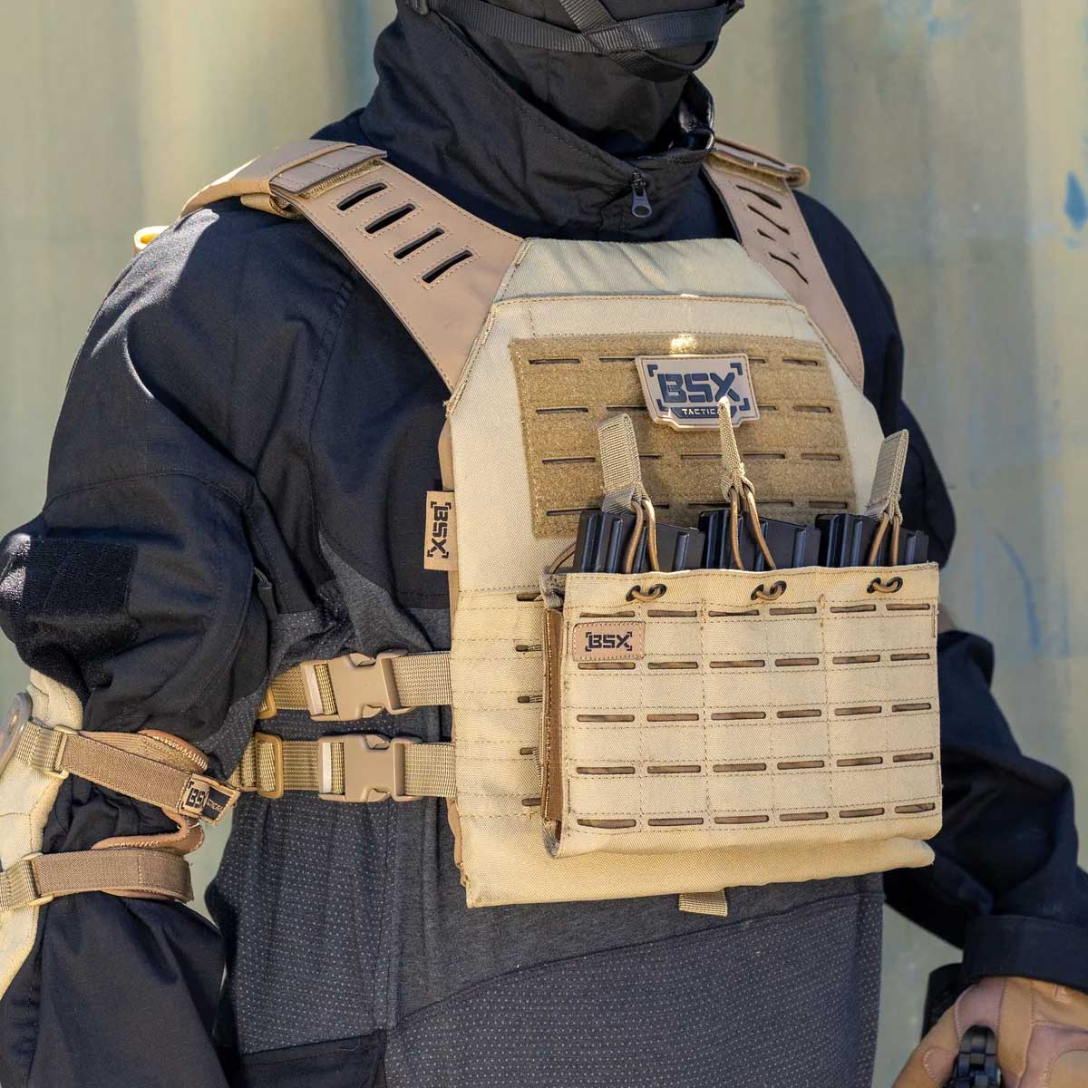 Front angle of tan BSX Plate Carrier LC for airsoft and paintball with mags on a person dressed in tactical gear