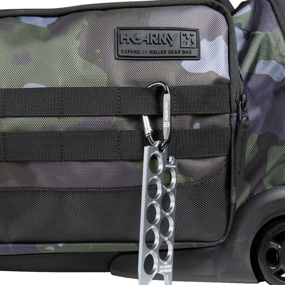 Detail view of molle straps of Black green and grey camo print HK Army Paintball Expand 75L Roller Gear bag Shroud Forest on a white background