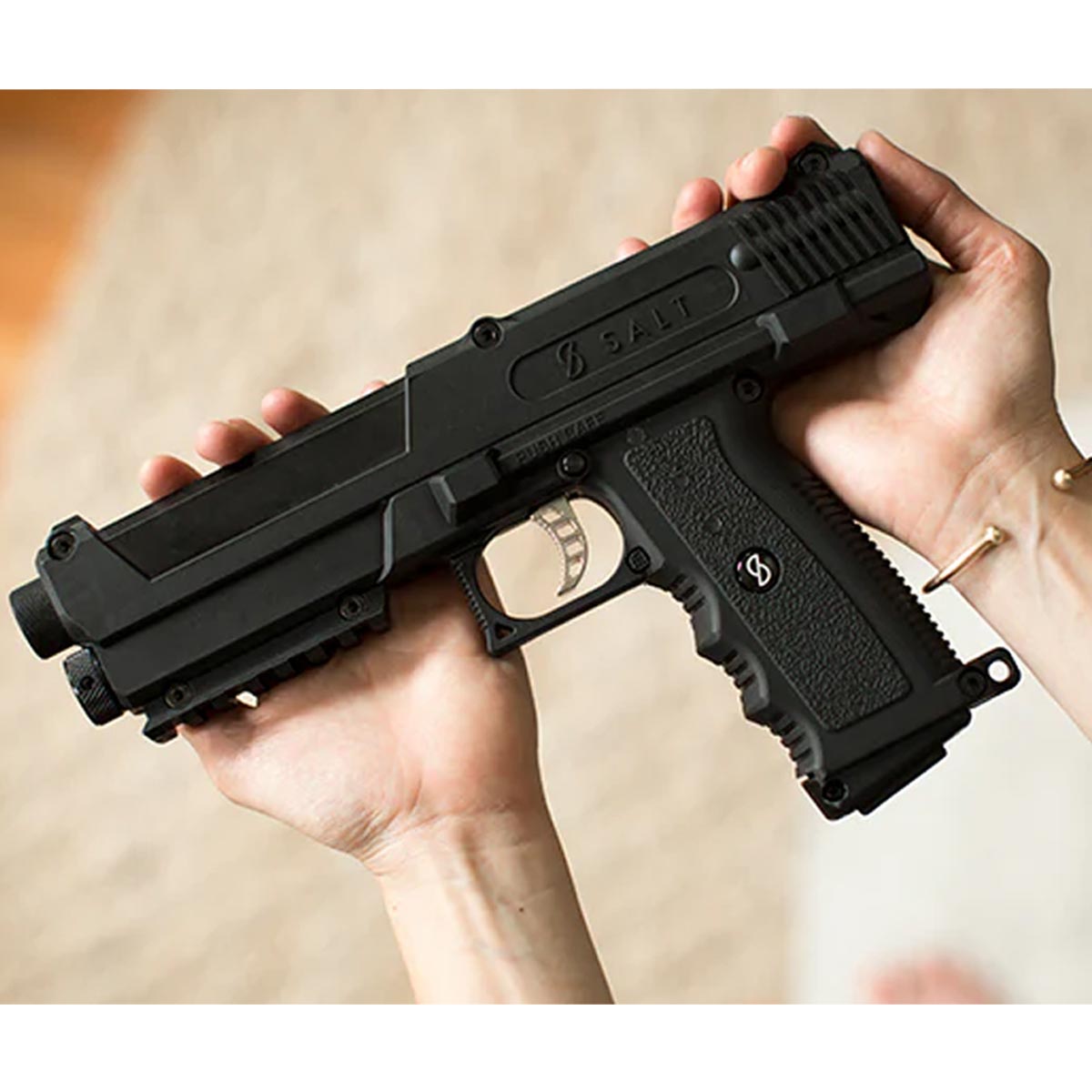 Salt .68 Caliber Self Defense launcher in a persons hands