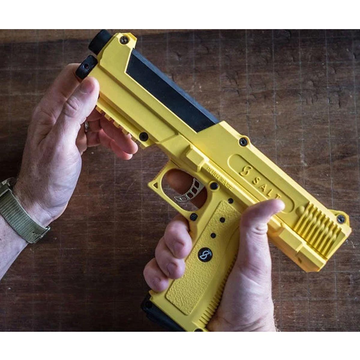 Salt .68 Caliber Self Defense launcher being held in two hands