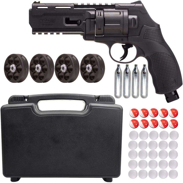Umarex T4E TR50 Gen 2 Revolver Pistol .50 Caliber Self Defense launcher with a black lockable case, 4 extra mags, 4 co2 cartridges, 10 pepper rounds and 25 glass break rounds all on a white background.