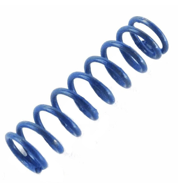 Blue Tippmann sear spring on a white background