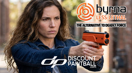 Woman shooting a Byrna CL in orange