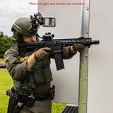 Person in tactical gear holding the T4E TC68 Full Auto Paintball Rifle Black