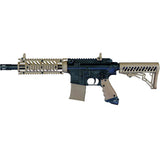 Left side Tippmann TMC Mag Fed Paintball Marker Tan with blanking dummy magazine