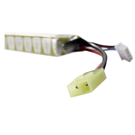 Close up of connector Elite Force 11.1V Lipo 900 MAH 15C Stick Battery with Tamiya Connector for airsoft on a white background.