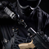 A black aluminum HK Army 9ci 3000 PSI high pressure tank with a black regulator shown with a launcher being held with a person.