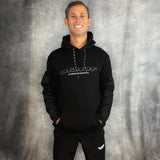 JT Paintball Grind Playing Hoodie Black on a person on a grey background