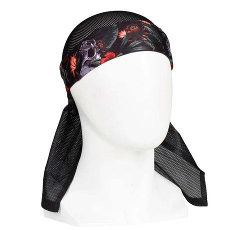 Front of HK Army Headwrap Tropical Skull Black, red, grey and green patterned headscarf on a mannequin head against a white background
