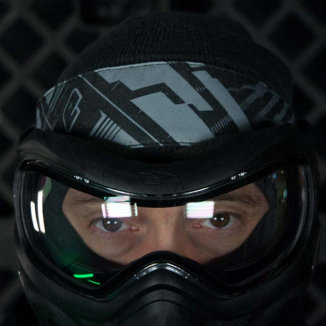 Eclipse DM Headband Beast in black grey on a person wearing a paintball goggle