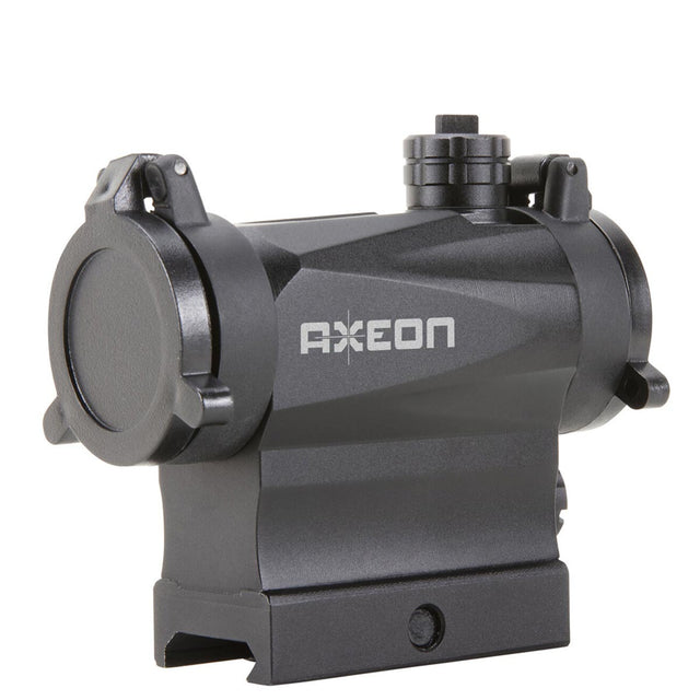 Left side angle view black AXEON 7XRGB20 Optic Tri Color Dot Sight for rifle mounting on a Picatinny rail.