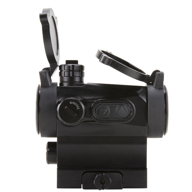 Left side view displaying windage dial cover in place, black AXEON 7XRGB20 Optic Tri Color Dot Sight for rifle mounting on a Picatinny rail with sight covers open.