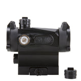 Left side view displaying windage dial black AXEON 7XRGB20 Optic Tri Color Dot Sight for rifle mounting on a Picatinny rail.