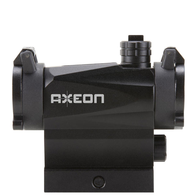 Left side view black AXEON 7XRGB20 Optic Tri Color Dot Sight for rifle mounting on a Picatinny rail.