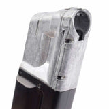 Close up of top of black and silver T4E S&W M&P9 .43 Cal 8rd CO2 Quick Pierce Paintball Magazine on a white background