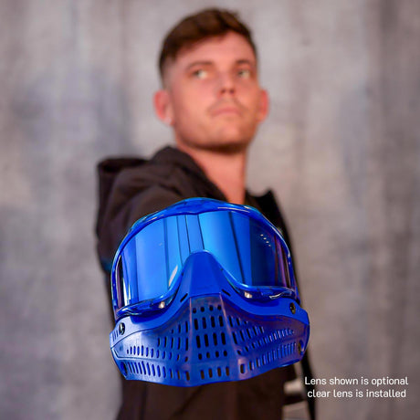 Blue JT ProFlex Birthstone Ice September Sapphire paintball mask held by a person against a gray background