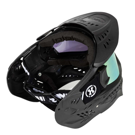 Back of Black HK Army HSTL Thermal Paintball Goggle mask with a gold lens and white AH logo on the side, shown against a plain white background.