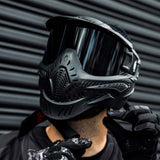Black HK Army HSTL Thermal Paintball Goggle mask with a smoke lens and white AH logo on the side, shown on a person.
