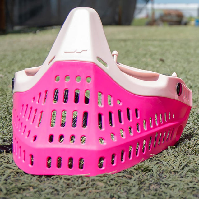 Pink and white JT goggle bottom skirt on grass