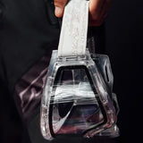 JT QLS Goggle Frame with Lens and Strap Clear Ice held by one hand