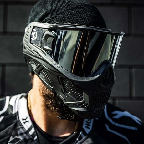 Person wearing a paintball goggle with HK Army HSTL Thermal Lens dual pane chrome mirror