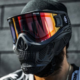Person wearing a paintball goggle with a HK Army HSTL Thermal Lens dual pane Fire red orange yellow