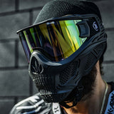 Person wearing a paintball goggle with HK Army HSTL Thermal Lens dual pane gold mirror