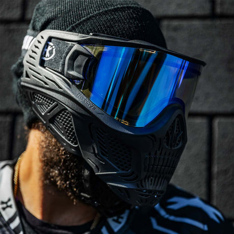 Person wearing a goggle with HK Army HSTL Thermal Lens dual pane Ice blue purple