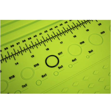 Close up of Eclipse Magnetic Tech Mat XL Green for paintball repairs with ruler, oring sizes, anti roll for barrels, roll up rubber on a white background.