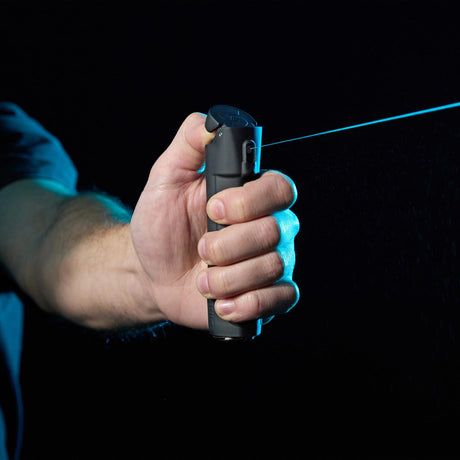 Sabre 2-In-1 Pepper Spray With Personal Alarm being used