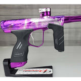 Right side body USED DYE DSR Pro PGA Grimace Purple Splash against a wood panel background.