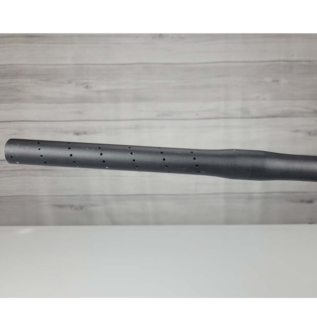 Left side barrel USED Empire Axe 2.0 Paintball Marker Black on a woodgrain background