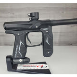Right side body USED Empire Axe 2.0 Paintball Marker Black on a woodgrain background