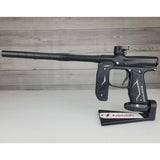 Left side USED Empire Axe 2.0 Paintball Marker Black on a woodgrain background