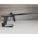 Right side USED DLX Luxe TM40 Paintball Marker Black against a woodgrain background