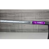 Close up of left side barrel Purple and silver USED Planet Eclipse LV2 Paintball Marker Havoc Grey Purple on a white surface with a wooden background