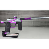 Right side Purple and silver USED Planet Eclipse LV2 Paintball Marker Havoc Grey Purple on a white surface with a wooden background