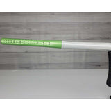 Left side barrel close up Green and silver USED Planet Eclipse Geo 3.5 Kyrpton Ice Green Silver paintball marker on a wood panel background.