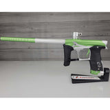 Green and silver USED Planet Eclipse Geo 3.5 Kyrpton Ice Green Silver paintball marker on a wood panel background.